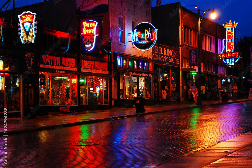 The neon lights form the bars and cafes of Beale Street in Memphis ...